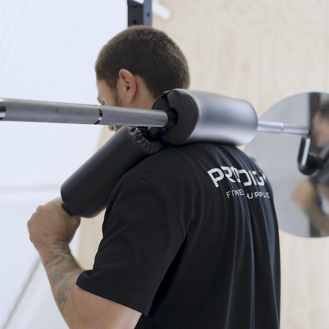 Prodigy Safety Squat Bar – Olympic 50mm | Padded Cambered Barbell